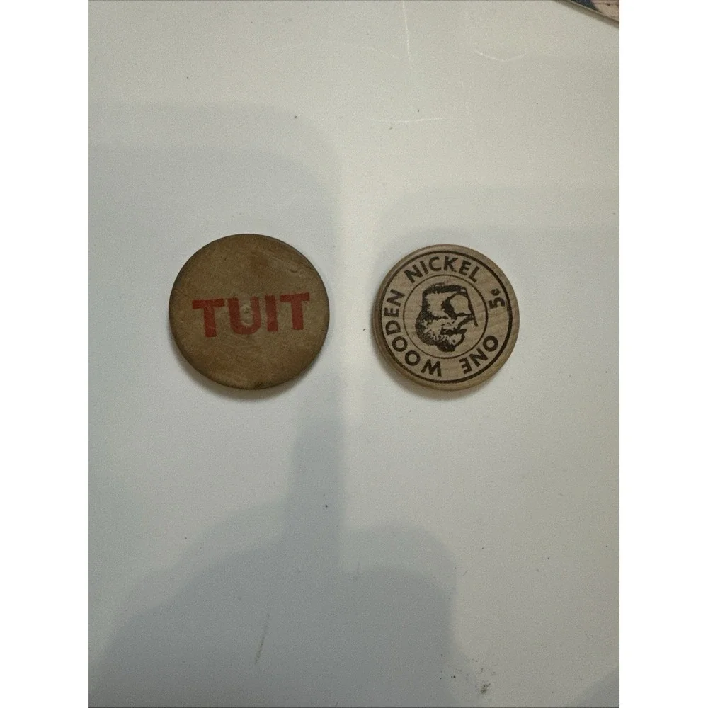 A Round Tuition‎ And Wooden Nickel